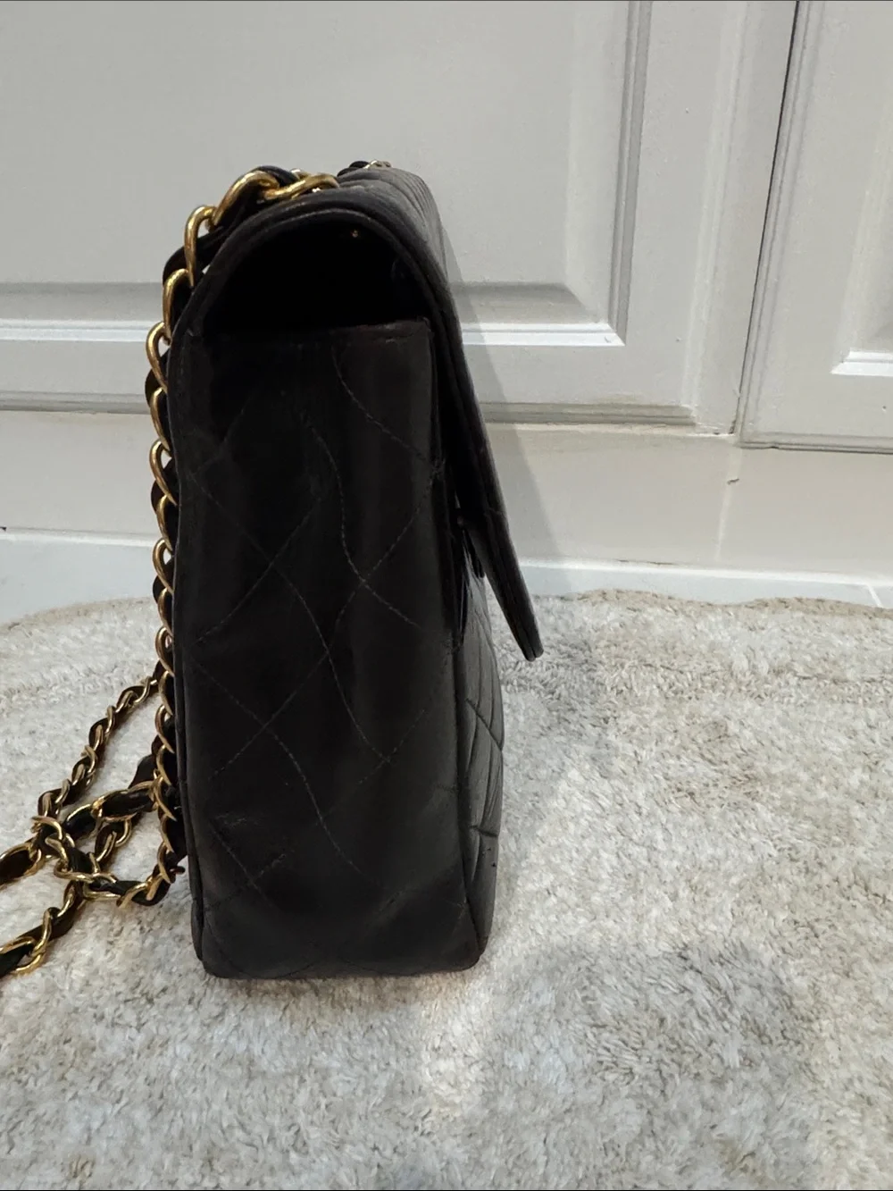 CHANEL Black Quilted Jumbo  Lambskin Flap Bag with Gold 24kt Hardware